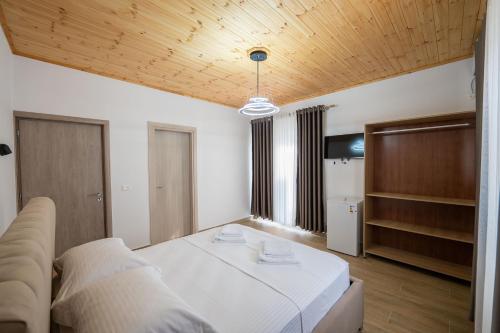 Postel nebo postele na pokoji v ubytování Vila Lukas
