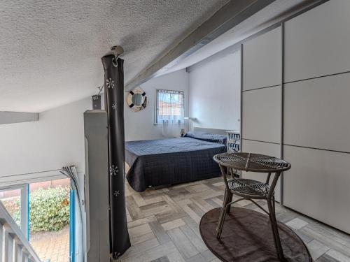 Ένα ή περισσότερα κρεβάτια σε δωμάτιο στο Maison à 350m de la plage avec terrasse, 4 pers., parking privé, Biscarrosse - FR-1-521-243