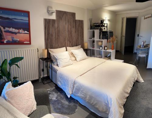 Postel nebo postele na pokoji v ubytování Studio Charmant&calme