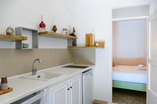Kuchyň nebo kuchyňský kout v ubytování Trullo Porta Antica