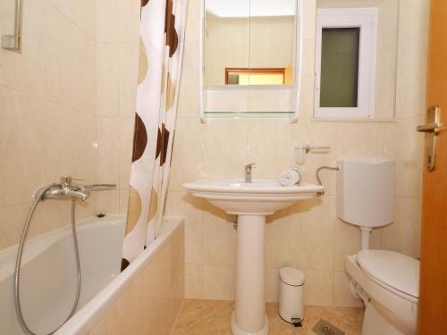 Koupelna v ubytování Apartment Vukadin
