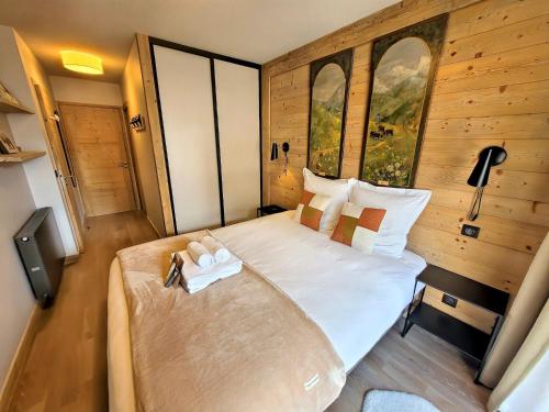 Appartement spacieux skis aux pieds, centre village, 8 pers, parking