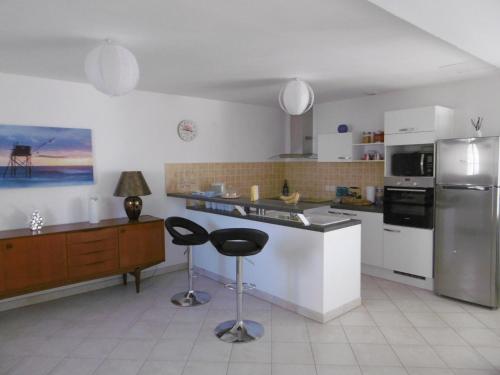 Photo de la galerie de l'établissement Maison à L'Herbaudière, proche plage et commerces, pour 6 personnes - FR-1-823-60, à Noirmoutier-en-l'lle