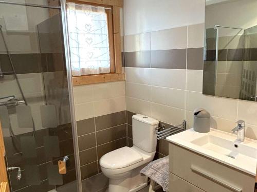 a bathroom with a toilet and a sink and a shower at Chalet individuel Les Saisies pour 12 pers., superbe vue Mont Blanc - FR-1-594-334 in Hauteluce