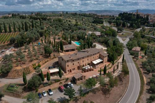 an aerial view of a house with a road at Il Miraggio in Val d'Orcia Relais & Spa in San Quirico dʼOrcia