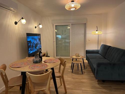 a living room with a couch and a table at La Mata Apartment, Spain in La Mata