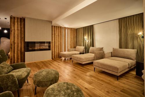 Ein Sitzbereich in der Unterkunft Natur Alpin Hotel Feichtner Hof