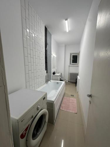 Postel nebo postele na pokoji v ubytování Group Old Town Apartment