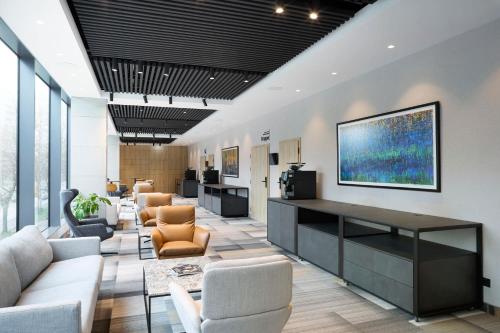 TV a/nebo společenská místnost v ubytování Q Hotel Plus Wrocław