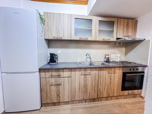 Køkken eller tekøkken på Τhair Vacation House