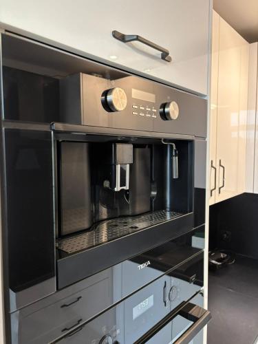 Η κουζίνα ή μικρή κουζίνα στο DWORAK apartment