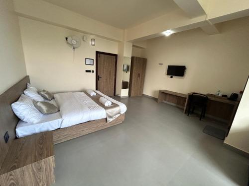 Μια τηλεόραση ή/και κέντρο ψυχαγωγίας στο Sunshine Guest House