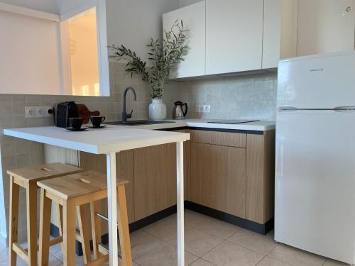 Kuchyň nebo kuchyňský kout v ubytování Einalia Holiday Homes