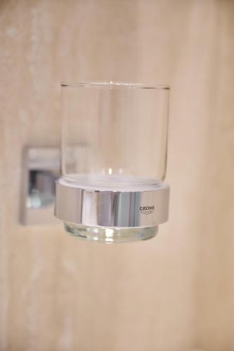 a food processor on a wall with a blender at Aparthotel 9 ALBERTI Nice Centre in Nice