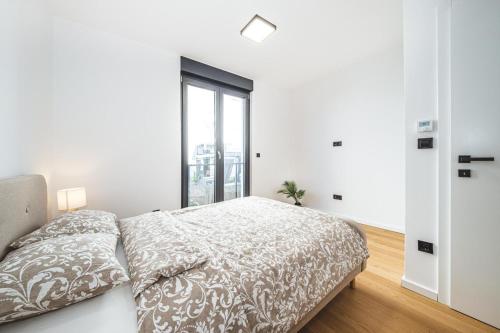 Katil atau katil-katil dalam bilik di Flex SelfCheckIns 182 - 2 Bedrooms - Parking