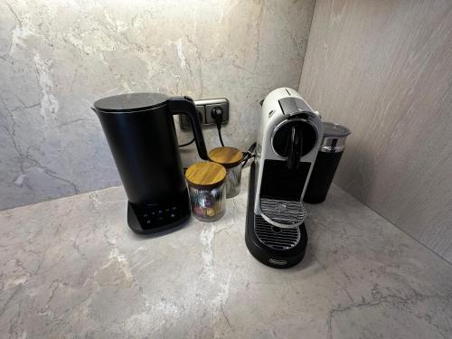 a coffee maker sitting on top of a counter at Haus der Weine in Rüdesheim am Rhein