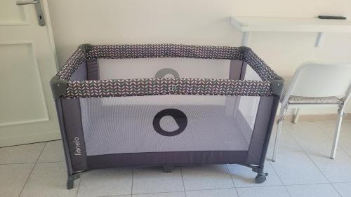 a cart with a letter o on it in a room at Cavour3 in Nettuno
