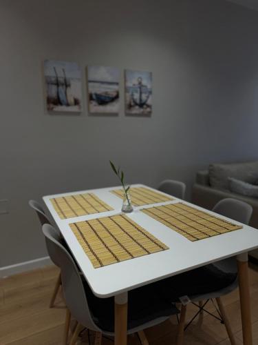 Posezení v ubytování Flos Apartament