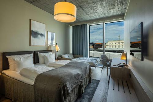 Una cama o camas en una habitación de Scandic Spectrum