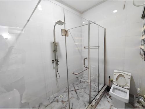 Vannituba majutusasutuses The Hub Apartment, Lekki