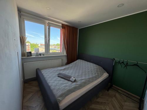 Katil atau katil-katil dalam bilik di ApartamentsByMatyrafa-XIII