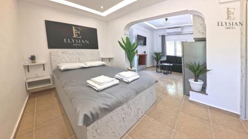 Ένα ή περισσότερα κρεβάτια σε δωμάτιο στο Elysian Luxury Suite N2