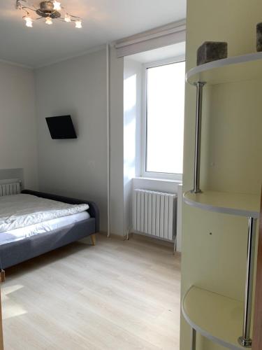 Postel nebo postele na pokoji v ubytování Leninstr