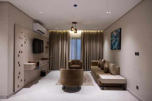 Χώρος καθιστικού στο الضيافة المثالية للشقق المخدومة Aldiyafa Serviced Apartments