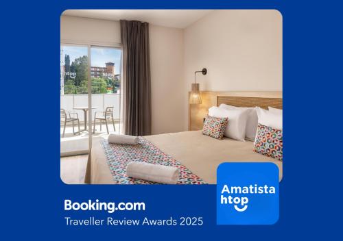 a hotel room with a bed and a balcony at htop Amatista #htopBliss in Lloret de Mar