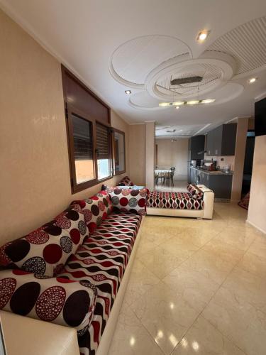 a large living room with couches in a room at Berber vibes in Tamraght Ouzdar
