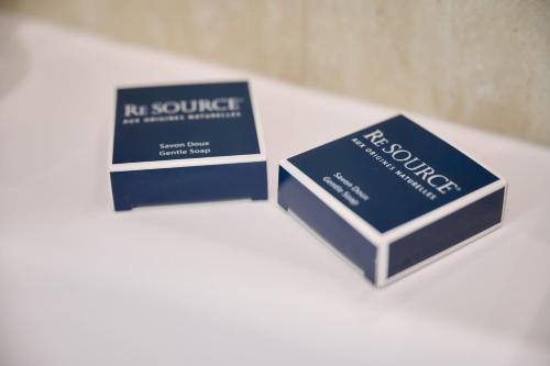 two boxes sitting on top of a table at Aparthotel 9 ALBERTI Nice Centre in Nice