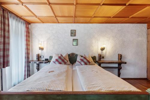 Postel nebo postele na pokoji v ubytování Gästehaus Löwen