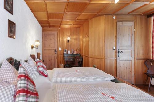 Postel nebo postele na pokoji v ubytování Gästehaus Löwen