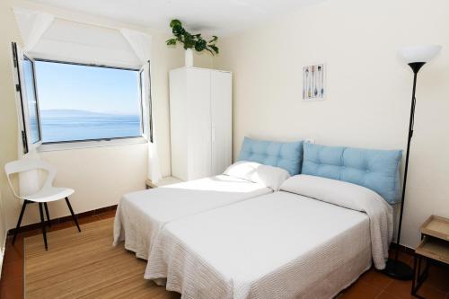 Ένα ή περισσότερα κρεβάτια σε δωμάτιο στο Casa Marzoa