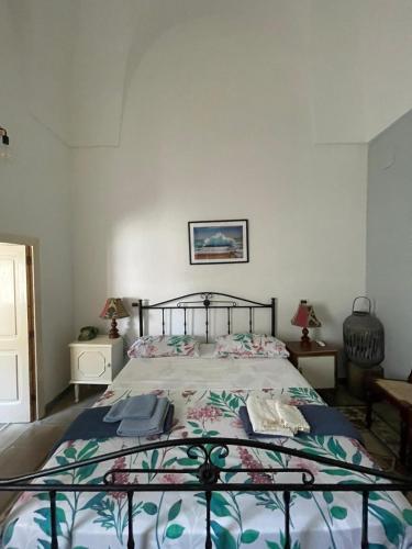 Ένα ή περισσότερα κρεβάτια σε δωμάτιο στο Relaxing home in Salento