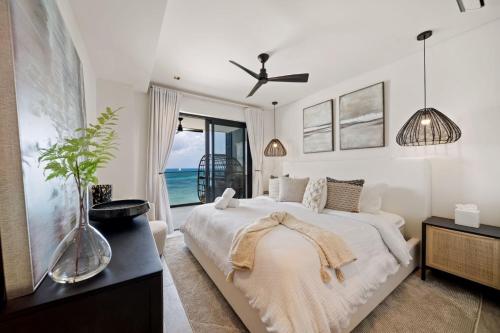 Allure 503 apts tesisinde bir odada yatak veya yataklar
