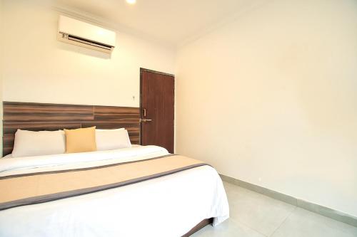 Un ou plusieurs lits dans un hébergement de l'établissement Sawraaz Hotel at Calangute North G0A