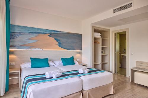 Postel nebo postele na pokoji v ubytování Welikehotel Fenix