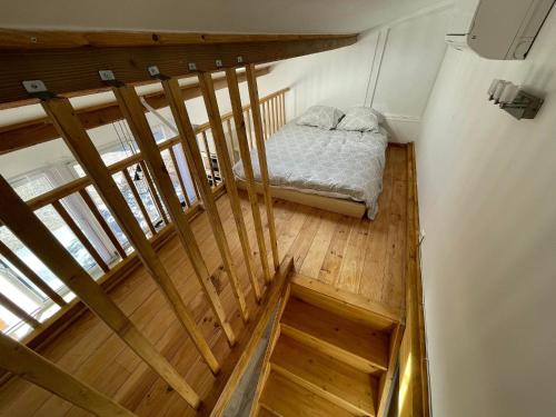 Llit o llits en una habitació de Le Baou