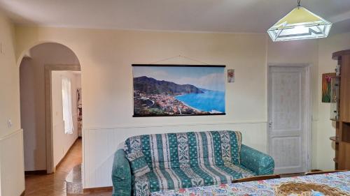 Postel nebo postele na pokoji v ubytování Casa vacanze Nonna Sara