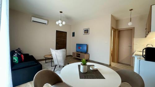 TV a/nebo společenská místnost v ubytování Central Station Apartments