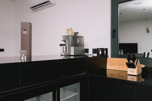 Příslušenství pro přípravu čaje a kávy v ubytování Casa Rio