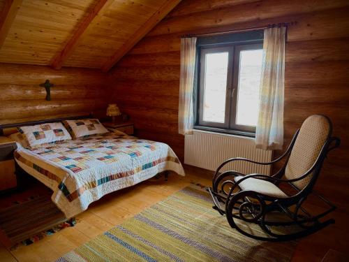 Katil atau katil-katil dalam bilik di Al Tronco Log Cabin