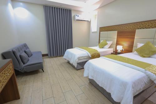 Postel nebo postele na pokoji v ubytování Velvet Resort