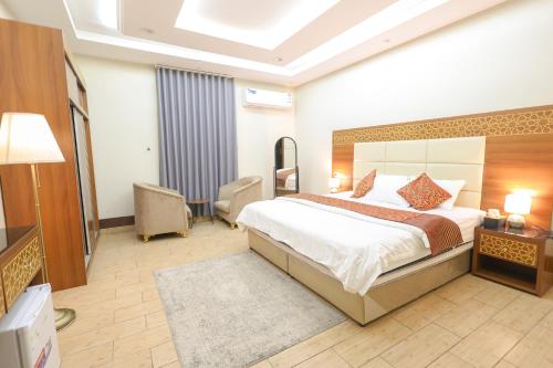 Postel nebo postele na pokoji v ubytování Velvet Resort