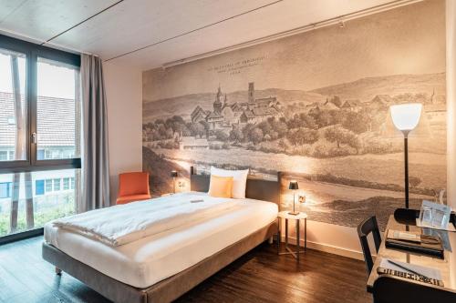 Postel nebo postele na pokoji v ubytování Hotel Greuterhof Islikon