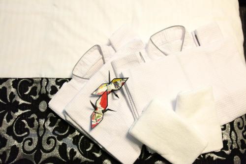 a white shirt with a kite on top of it at HOTEL neoWorld in Osaka