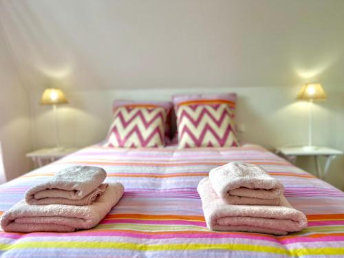 Llit o llits en una habitació de Ker Anna