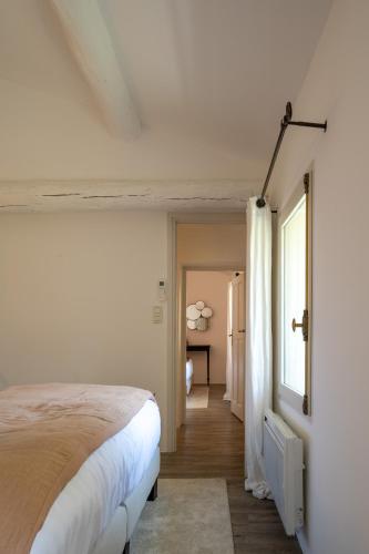 Cama o camas de una habitación en Gîte Terrasse