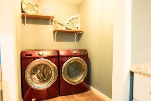 a washer and dryer in a laundry room at Lakefront Texoma Harbor - 33 in Mead